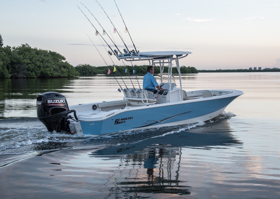 small boat anchored with a black suzuki boat engine perfect choice for powering lightweight boats