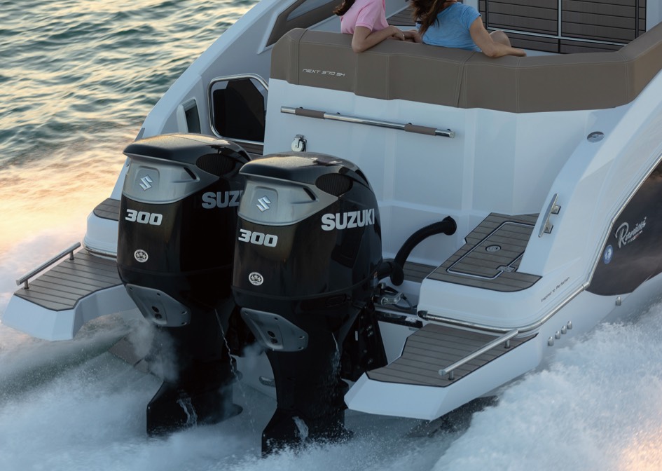 suzuki 300 outboards attached on a small boat ideal for fishing and other water activities