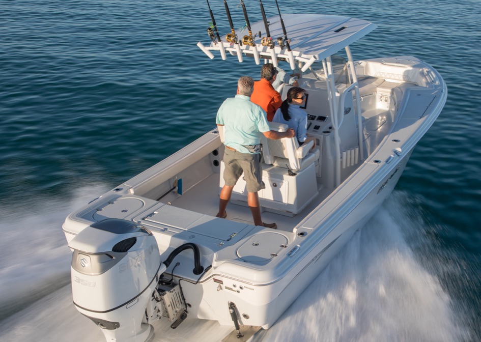 small white boat anchored with a DF350A OUTBOARD